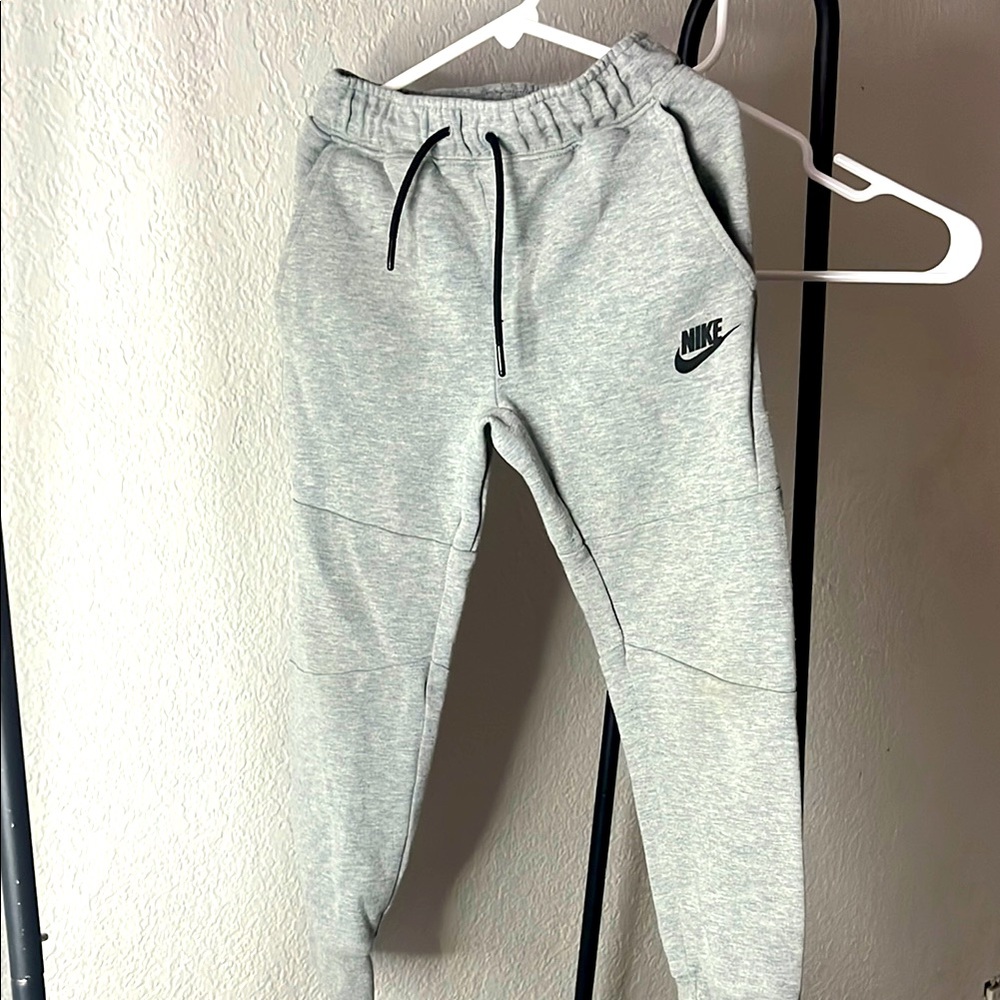 Nike Gray Sweatpants with Tapered Fit and Elastic Cuffs